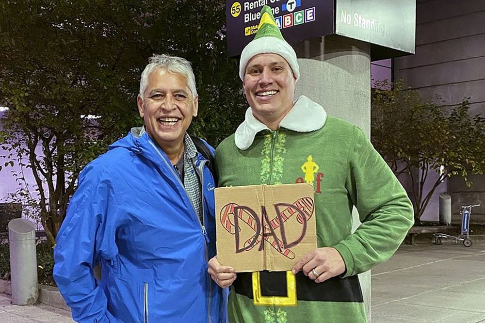 A Man Meets His Dad Dressed as Buddy from the Movie “Elf”