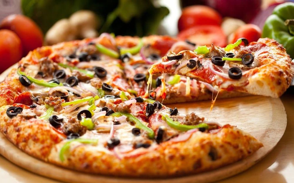 Grad Student Raises $30,000 for Charity for “Pizza Drops”